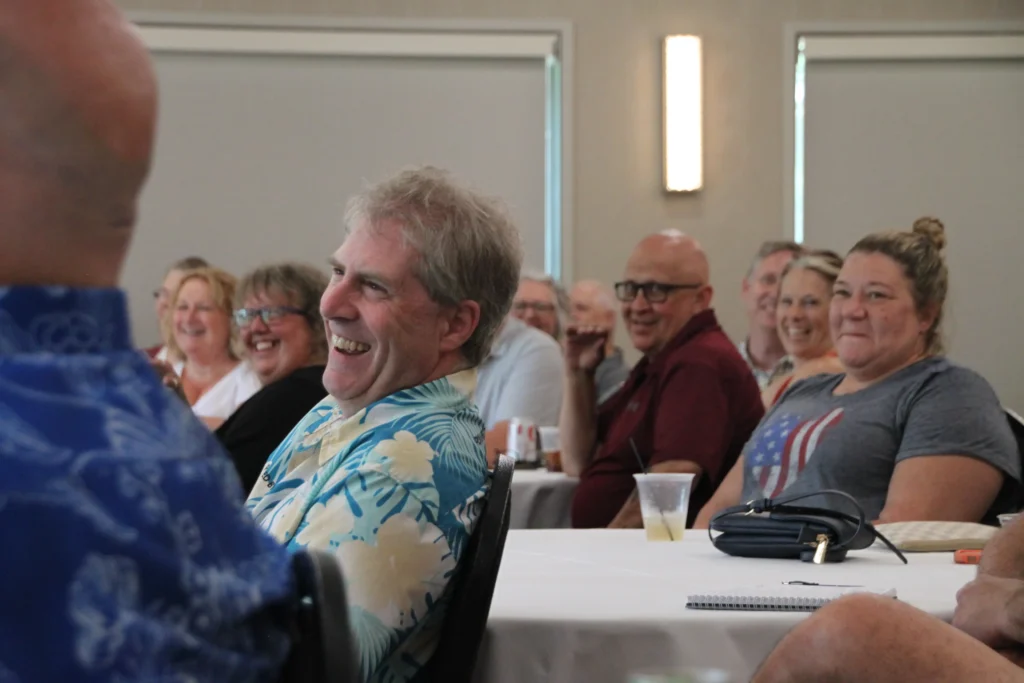 Audience member laughing