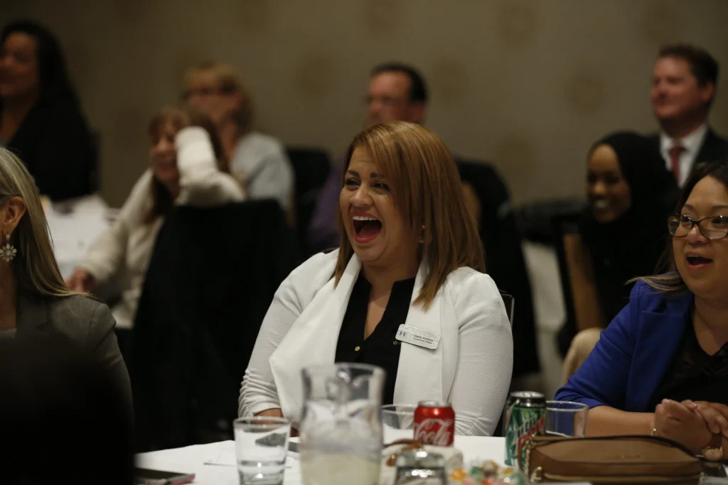 Woman laughs at Tim Gabrielson's performance